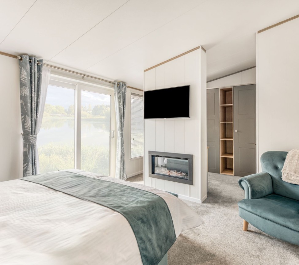 double bedroom with chair in the 2025 Atlas Laburnum Lodge 